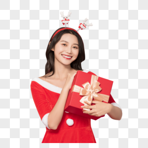 甜美女性戴圣诞头饰拿圣诞礼物盒图片