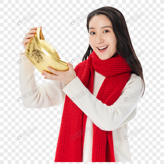 女性手捧金元宝迎新春过新年图片