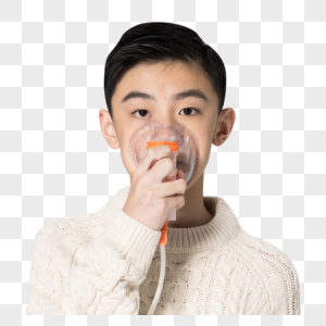青少年男生佩戴氧气面罩高清图片