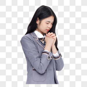 中学生女孩闭眼祈祷高清图片