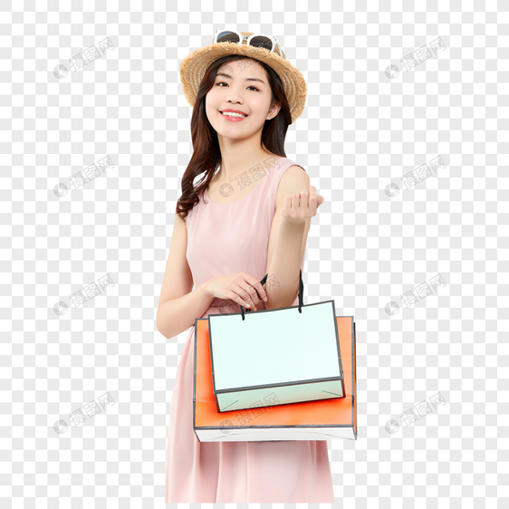 时尚女性戴草帽购物图片