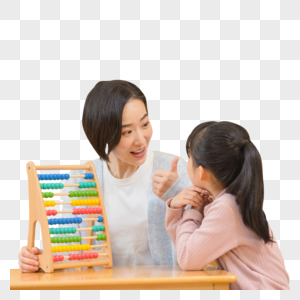 幼儿园老师与小女孩玩玩具高清图片