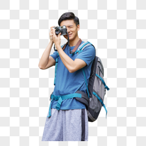 青年男性徒步拿相机拍照图片