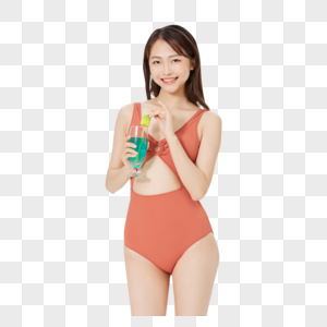 夏日泳装美女喝果汁解渴图片