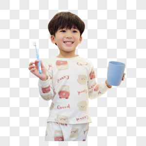 穿着睡衣在洗漱台刷牙的小男孩图片