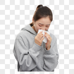 过敏的女性使用纸巾擦鼻子图片