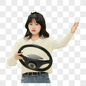 可爱少女手拿方向盘提醒安全驾驶图片