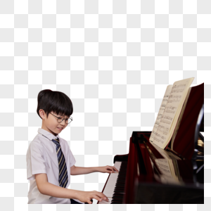 儿童学生学习弹奏钢琴曲高清图片