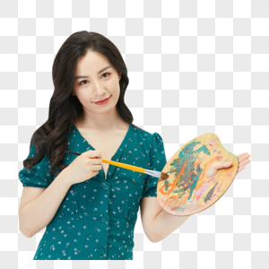 美女画家手拿调色板和画笔图片