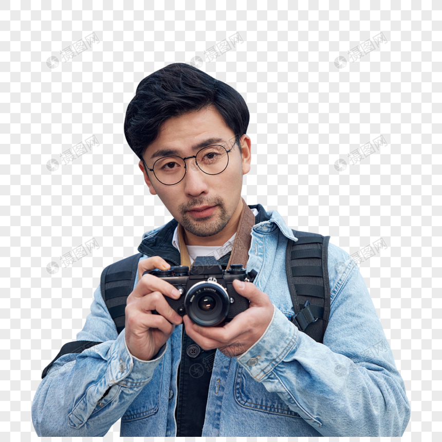 手拿相机的男摄影师形象图片