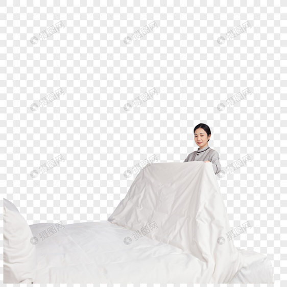 整理客房床铺的酒店女服务员图片