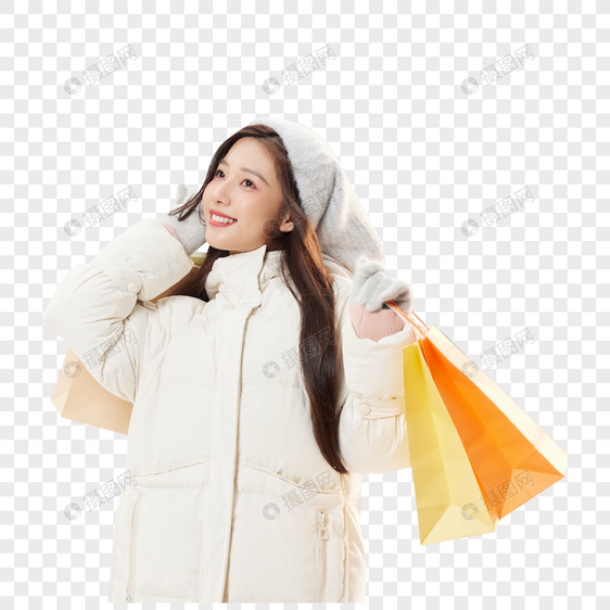 雪地冬季美女手拿购物袋形象图片