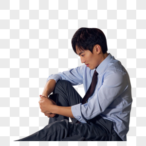 洒在地上的红酒.商务男性疲惫瘫坐在地上素材