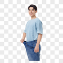 减肥成功的男性手拉裤子图片