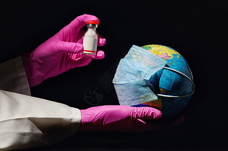 女性手着面具疫苗来抗病毒背景图片