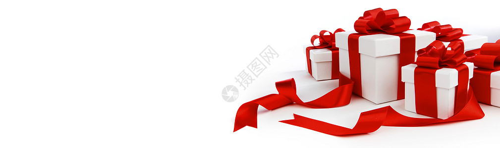 节日礼品盒,红色蝴蝶结隔离白色背景上白色带有红色蝴蝶结的礼品盒图片