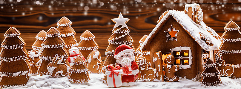 姜饼屋圣诞树圣诞老人礼物饼干寒假庆祝姜饼屋树背景