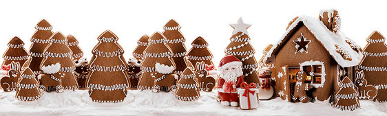 姜饼屋圣诞树圣诞老人礼物饼干寒假庆祝孤立白色背景上姜饼屋树图片