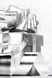 装饰银盒与节日礼物闪亮的闪光背景带节日礼物的盒子图片