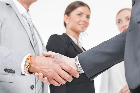 商务握手的商务人员团队白色商务握手团队合作图片
