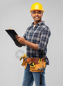 专业,建筑建筑思维印度工人或建筑工人头盔与剪贴板铅笔灰色背景用剪贴板铅笔思考建设者图片