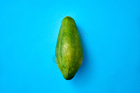 水果,饮食食物的蓝色背景成熟的木瓜蓝色背景上成熟的木瓜图片