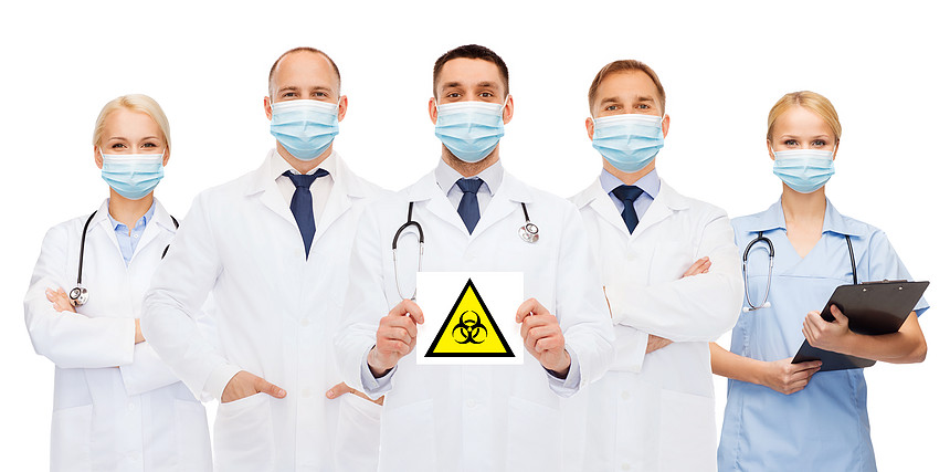 健康,医学大流行医生戴着保护医疗面具,白色背景上佩戴生物危害警告标志医生戴着带有生物危险标志的医用口罩图片