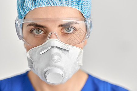防霾面具医学医疗保健大流行密切年轻女医生或护士戴护目镜面罩或呼吸器,以防止病疾病医生戴护目镜防护面罩背景