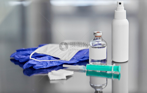 药物保健注射器,药物,伤口擦拭,洗手液与手套口罩桌子上注射器,药品,手套口罩图片