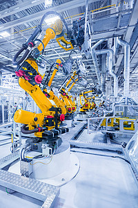 汽车工厂的机器人手臂汽车厂的机器人图片
