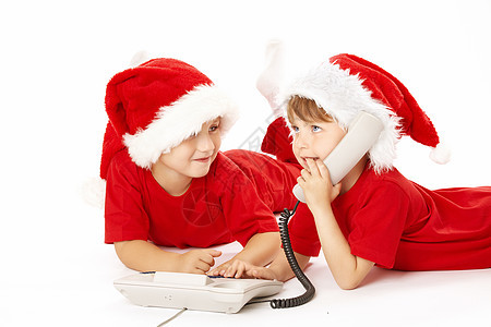 两个戴帽子的小男孩,圣诞老人打电话,图片