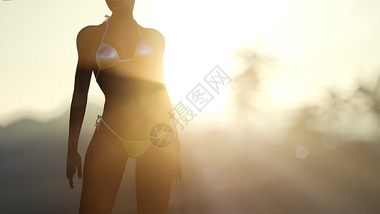 日落时,穿着泳衣的年轻女人棕榈树附近日落时穿着泳衣的年轻女人图片