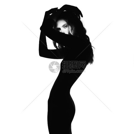 黑白艺术时尚肖像美丽的女人与光束她的脸上模特白色背景上摆姿势图片