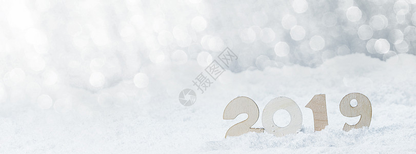 2020年新年雪理念木制2020年新年水平模板与银色闪光背2019年雪中新年图片