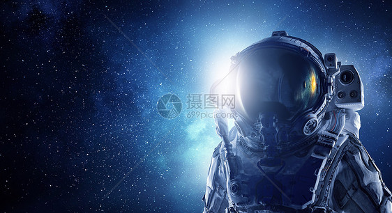 太空任务中的宇航员,背景上有星空宇航员先驱做研究图片