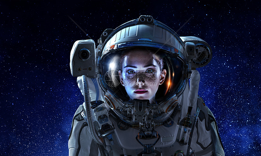 黑暗星空背景下女宇航员的肖像穿着太空服的有魅力的女人高清图片下载 正版图片 摄图网