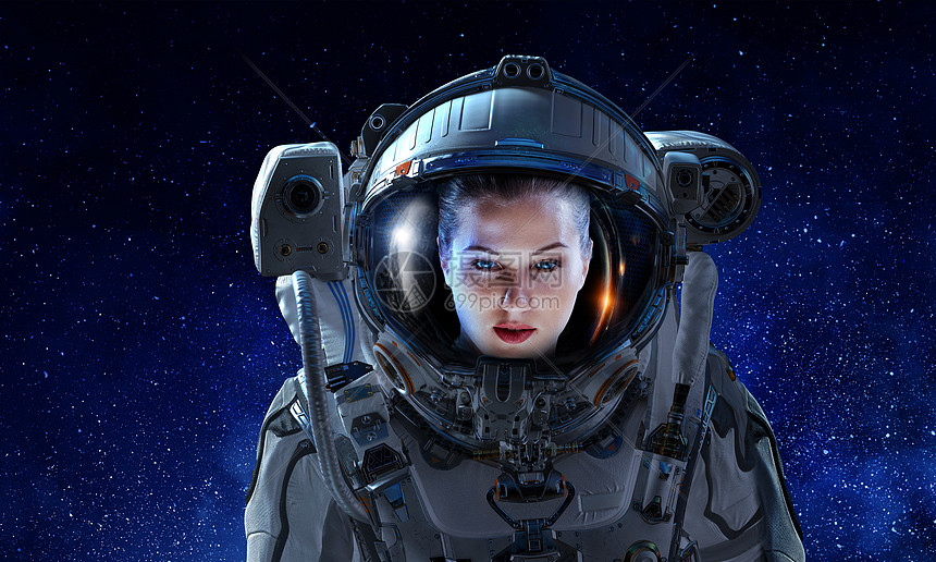 黑暗星空背景下女宇航员的肖像穿着太空服的有魅力的女人高清图片下载 正版图片 摄图网