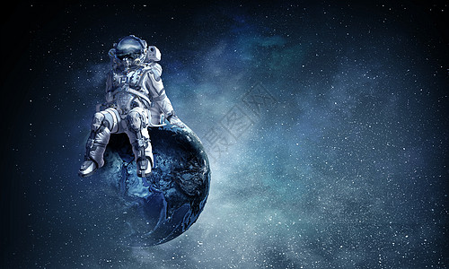宇航员坐地球上这幅图像的元素由美国宇航局提供的宇航员穿着太空服地球上图片