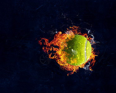大网球黑暗背景下燃烧火焰网球火中图片