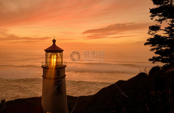 海塞塔头灯塔日落,太平洋海岸,建于12,俄勒冈州,美国图片