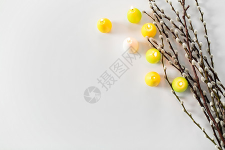 节日象阴柳枝复活节彩蛋蜡烛白色背景阴柳枝复活节彩蛋蜡烛图片