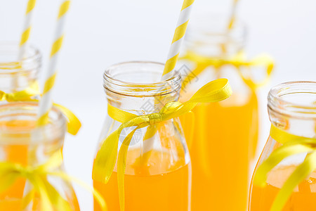 饮料派橙汁柠檬水装饰璃瓶与纸吸管璃瓶中的橙汁纸吸管图片