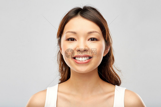 美丽人的快乐微笑的亚洲轻女人的脸快乐微笑的亚洲轻女人图片