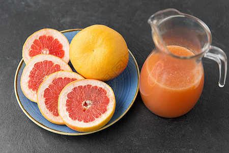食物,健康饮食素食杯果汁与葡萄水果盘壶果汁,盘子里葡萄柚图片