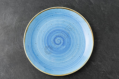 餐桌,餐具饮食蓝色陶瓷板石板背景石板背景上蓝色陶瓷板背景图片