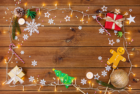 雪花灯圣诞节假日木制背景上的电动花环装饰品背景