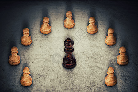 黑色皇后棋子周围的白色棋子连接他们的力量商业集领导队工作的象征图片