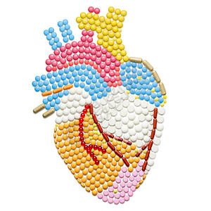 人的心脏形状的药丸,隔离白色上图片