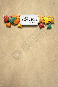 创意感恩节照片的叶子制成的纸张棕色背景艾莉丝古特图片