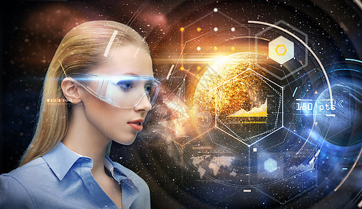 ,未来技术人的美丽的未来主义女人虚拟现实眼镜上的行星全息图背景太空上虚拟现实眼镜中的女人图片